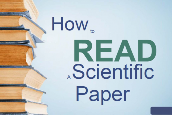 "How to read a scientific paper" text with a stack of books on the left. The word "Read" is all capitalized and in larger font