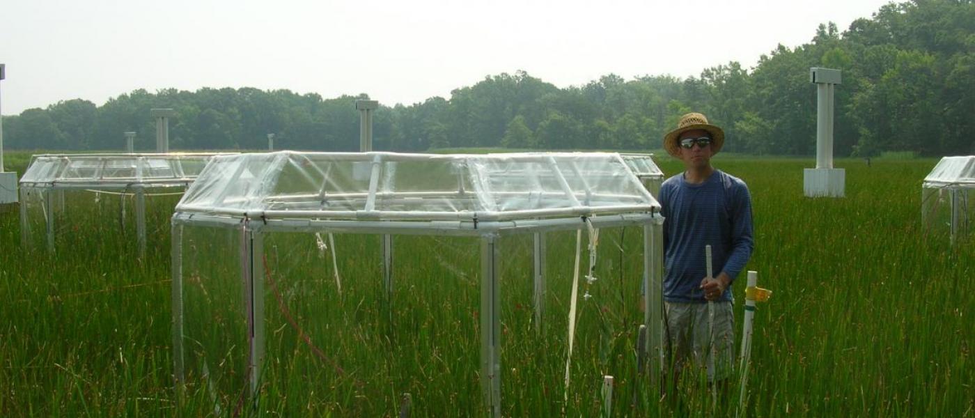 Adam Langley beside experimental chamber