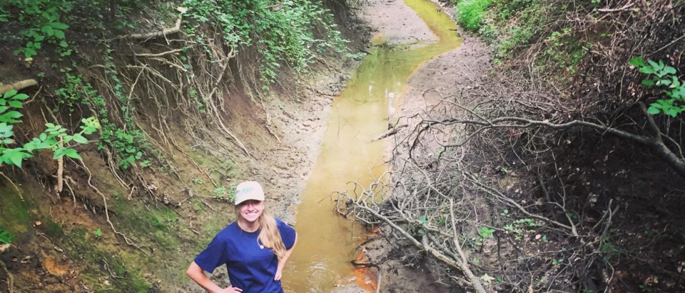 Intern Julianne Rolfe inside SERC's Muddy Creek floodplain restoration site